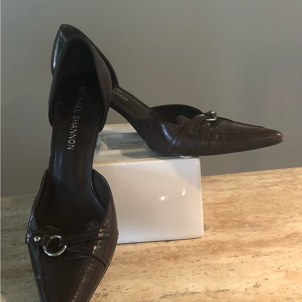 Michael Shannon Brown D’Orsay heels with buckle detail. Stylish & versatile.